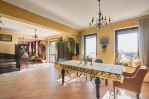 a dining room with a table and chairs at Dom Pujszany in #N/A