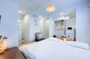 Кровать или кровати в номере japan house asakusa