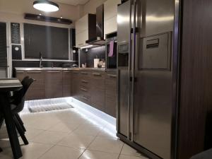 Kuchyň nebo kuchyňský kout v ubytování Luxury Home
