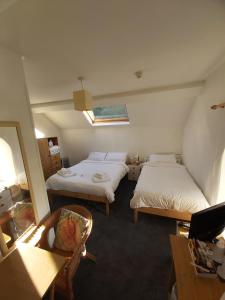 Krevet ili kreveti u jedinici u okviru objekta isallt guesthouse