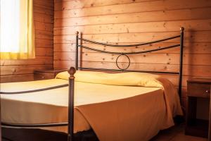 Кровать или кровати в номере Il Veliero