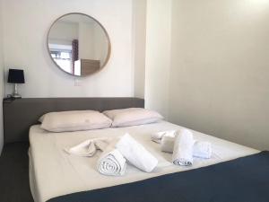 Posteľ alebo postele v izbe v ubytovaní Islanders Yard Apartments