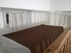 Posteľ alebo postele v izbe v ubytovaní Islanders Yard Apartments
