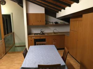 A kitchen or kitchenette at Casa Mario Lupo - Apartments and Rooms