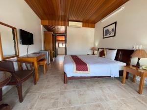TV a/nebo společenská místnost v ubytování Sunshine Hoian Hotel