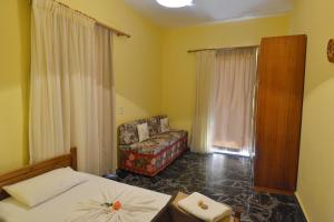 Posteľ alebo postele v izbe v ubytovaní Zambia Apartments