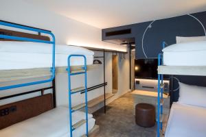 Posteľ alebo postele v izbe v ubytovaní H2 Hotel Budapest