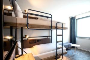 Posteľ alebo postele v izbe v ubytovaní H2 Hotel Budapest