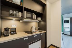 Kuchyň nebo kuchyňský kout v ubytování Nena Apartments - Kreuzberg 61