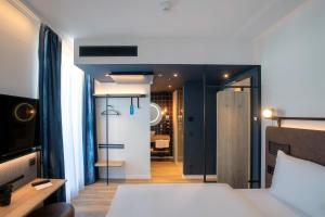 Posteľ alebo postele v izbe v ubytovaní H2 Hotel Budapest