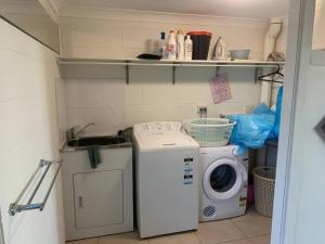 A kitchen or kitchenette at Riverview Apartment