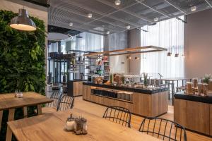 Reštaurácia alebo iné gastronomické zariadenie v ubytovaní H2 Hotel Budapest
