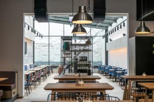 Reštaurácia alebo iné gastronomické zariadenie v ubytovaní H2 Hotel Budapest