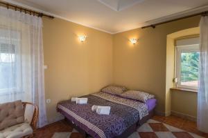 Posteľ alebo postele v izbe v ubytovaní Villa Stocco