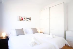 Posteľ alebo postele v izbe v ubytovaní Attic Bcn Central Terrace
