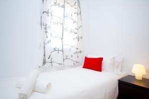 Posteľ alebo postele v izbe v ubytovaní Attic Bcn Central Terrace