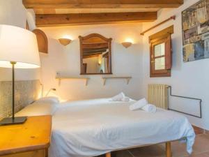 Łóżko lub łóżka w pokoju w obiekcie Finca Son Xona Alcina Vacation