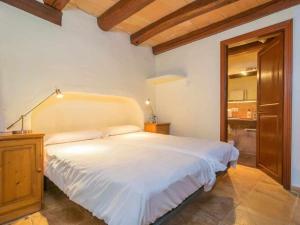 Łóżko lub łóżka w pokoju w obiekcie Finca Son Xona Alcina Vacation
