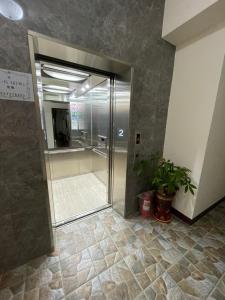 Gallery image of 這一村這一棧電梯海景民宿 in Lieyu