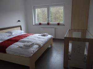 Katil atau katil-katil dalam bilik di Relax Center Olimian