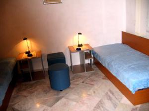 A bed or beds in a room at Oasis no 1 Apartment in Ravda