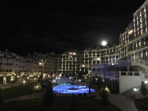 The swimming pool at or close to By the Waves luxury beach apartment