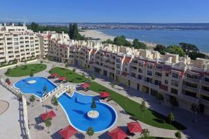 The swimming pool at or close to By the Waves luxury beach apartment