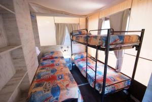 Camping Village Scaglieri客房内的一张或多张床位