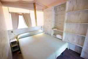 Camping Village Scaglieri客房内的一张或多张床位