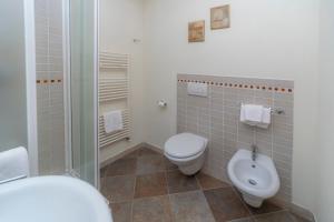 Koupelna v ubytování Hotel Gran Trun