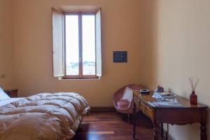A bed or beds in a room at Vatican Luxury View
