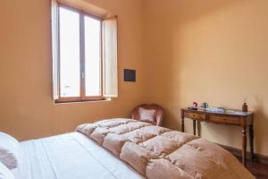 A bed or beds in a room at Vatican Luxury View