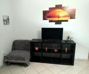 A seating area at Appartamento La Bonifica