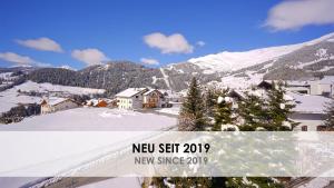 two photographs of a snow covered town with a mountain at Apart-Hotel Dreisonnenhof in Fiss