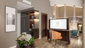 TV a/nebo společenská místnost v ubytování Hotel St Martin by OMNIA hotels