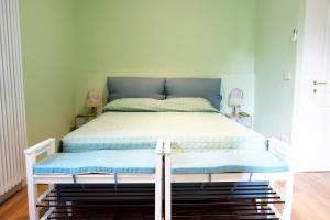 A bed or beds in a room at Meuble' 21 di Anna