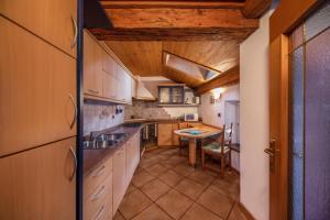 Virtuvė arba virtuvėlė apgyvendinimo įstaigoje Mandarda stile rustico 6/8 letti