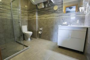 Koupelna v ubytování Hotel Jonapolis