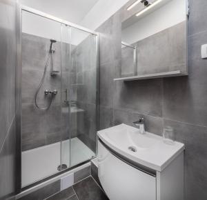 a bathroom with a shower and a sink at Luxury Studios & Room Five in Split