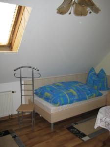 
Ein Bett oder Betten in einem Zimmer der Unterkunft Ferienwohnung "Lindenblick"
