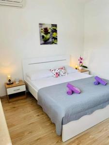 Postel nebo postele na pokoji v ubytování Apartman & rooms Draga