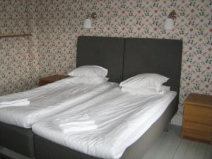 Postel nebo postele na pokoji v ubytování Villa Bro