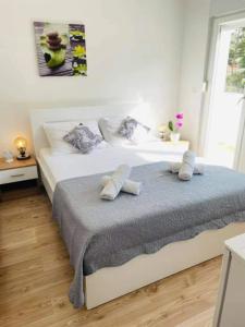 Postel nebo postele na pokoji v ubytování Apartman & rooms Draga