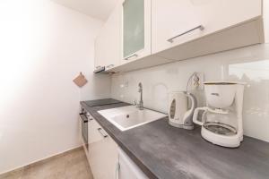 Kuchyň nebo kuchyňský kout v ubytování Bungalows Ivan (3757) + 37 fotografií