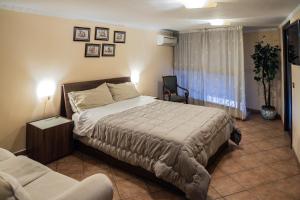 A bed or beds in a room at Domus Ugo