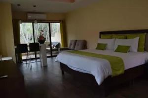Letto o letti in una camera di Hotel Chapala Country