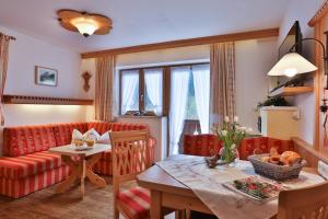 Posezení v ubytování Gästehaus Eckau Ferienwohnungen