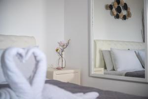 Postel nebo postele na pokoji v ubytování Blue Soul Luxury Villa