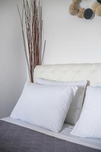 Postel nebo postele na pokoji v ubytování Blue Soul Luxury Villa