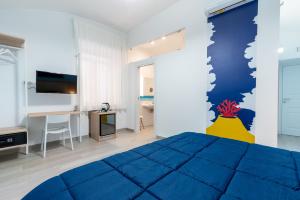 A bed or beds in a room at Bianco Latte